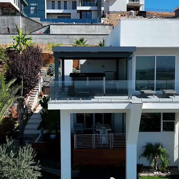 Pergola installed on a modern balcony deck, providing shade and enhancing the outdoor space.